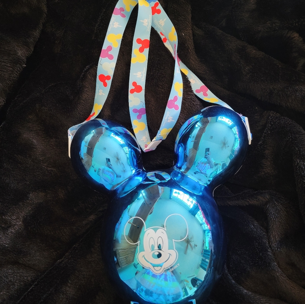 Mickey mouse popcorn bucket. blue balloon